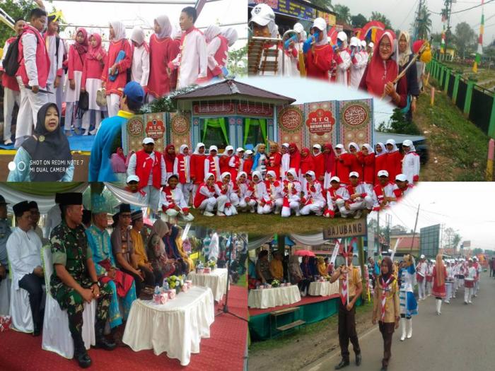 DRUMBAND IDZATUL ISLAM MTsN 4 BATANG HARI  MENJADI PERWAKILAN KECAMATAN BAJUBANG DALAM PAWAI TAâ€™RUF MTQ KE-51 TINGKAT KABUPATEN BATANGHARI DI KECAMATAN PEMAYUNG