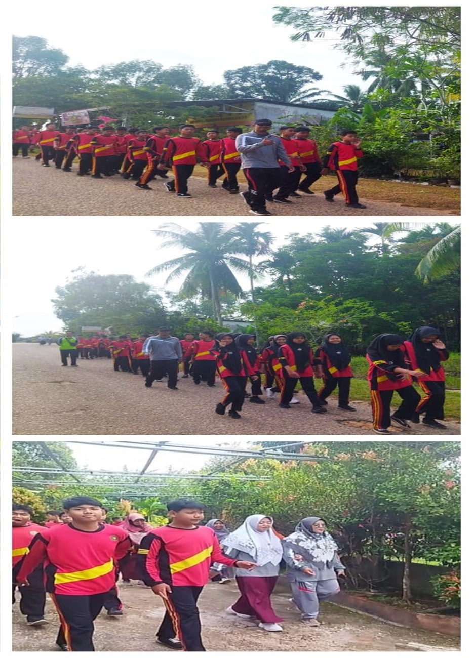 Peserta Didik MTs N 4 Batang Hari Gelar Jalan Sehat di Sekitar Kelurahan Bajubang