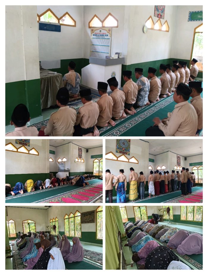 Sholat Zhuhur Berjamaah di Musholla Bahrul Ulum MTsN 4 Batanghari Diimami Langsung oleh Kepala Madrasah.