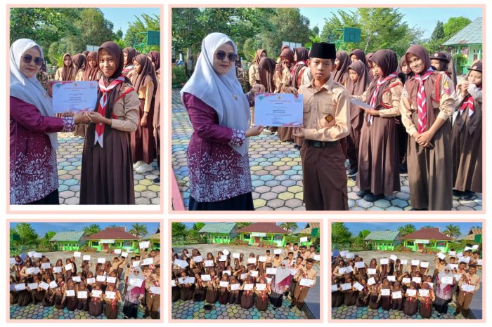 Penyerahan Piagam Penghargaan Kepada Anggota Drum Band Izzatul Islam MTsN 4 Batang Hari Penyerahan Piagam Penghargaan Kepada Anggota Drum Band Izzatul Islam MTsN 4 Batang Hari