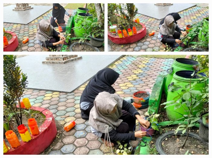 Ibu Nani Sukaisih Giat Lakukan Penghijauan, Wujudkan MTsN 4 Batanghari yang Asri dan Hijau